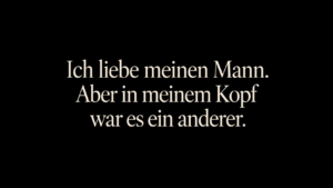 Schwarzer Hintergrund. Text darüber. Ich liebe meinen Mann aber in meinem Kopf war es ein anderer.